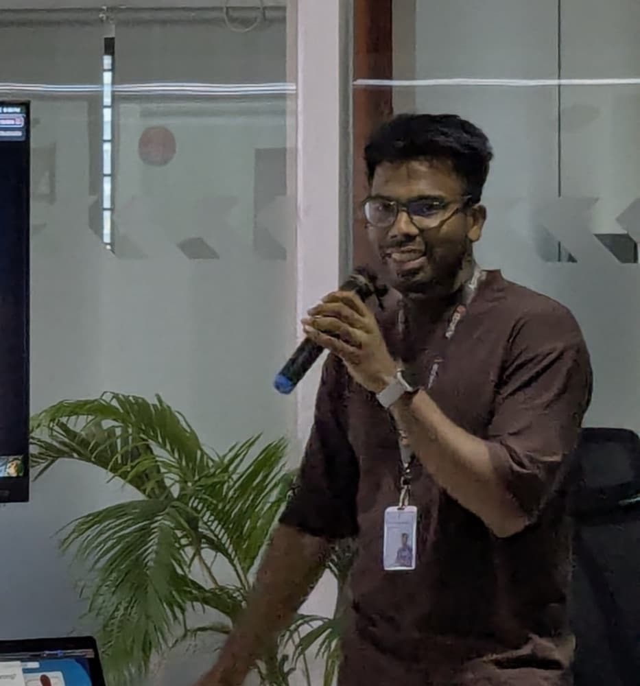 Samss Jubair speaking at a session